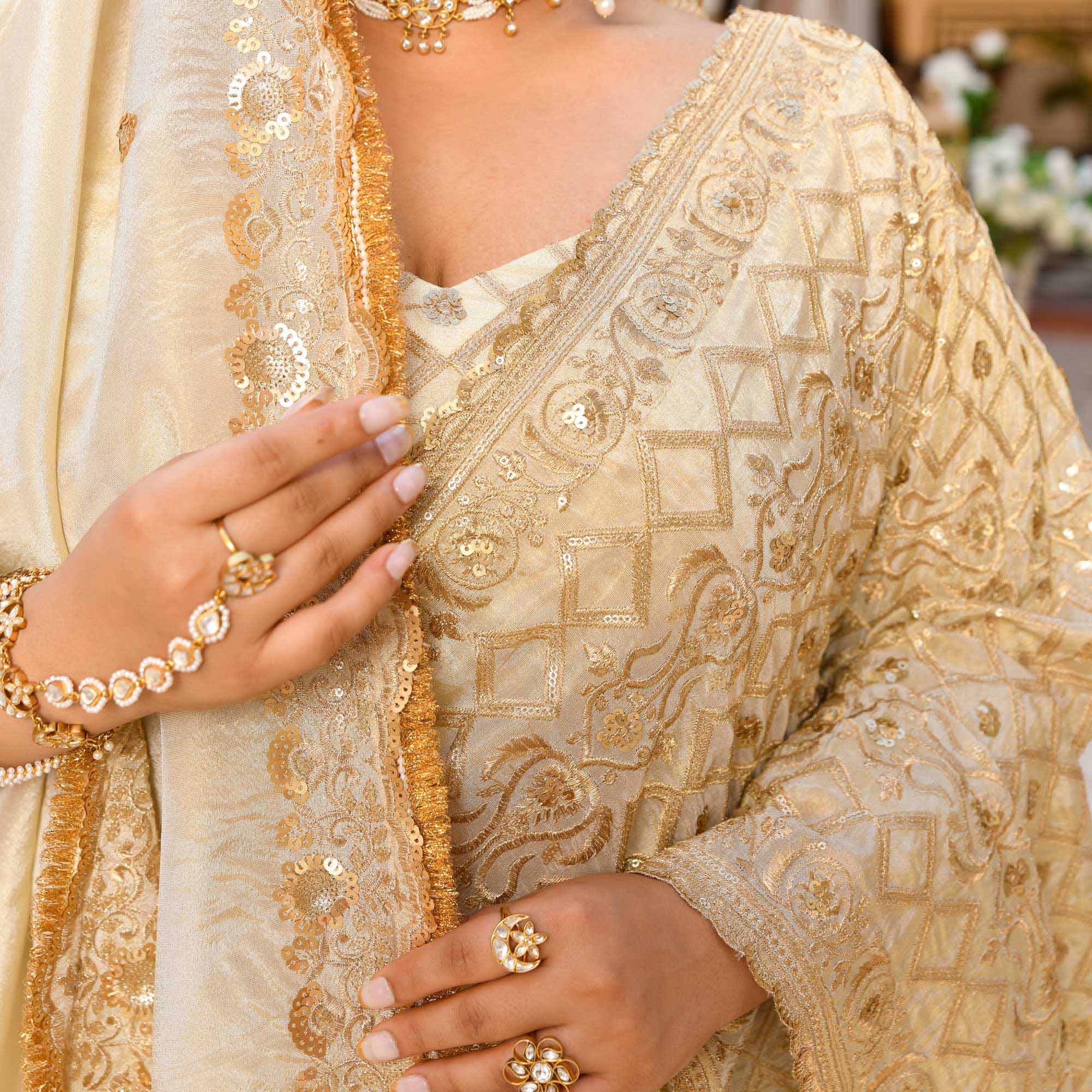 RANJHNA- Ivory & Gold Sequin Embroidered Pure Tissue Silk Lehenga Set