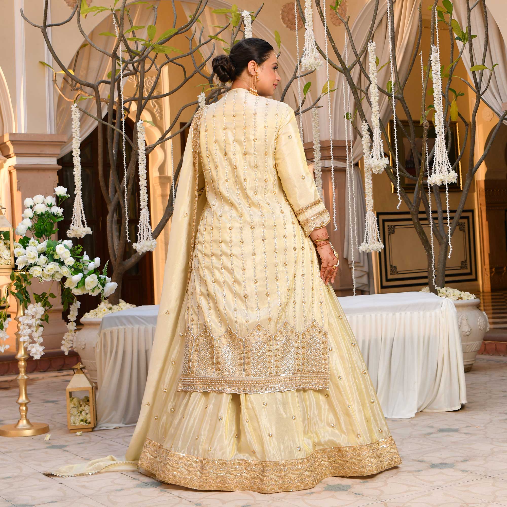 TAAJ- Ivory & Gold Cutdana Embroidered Lehenga Set with Cape