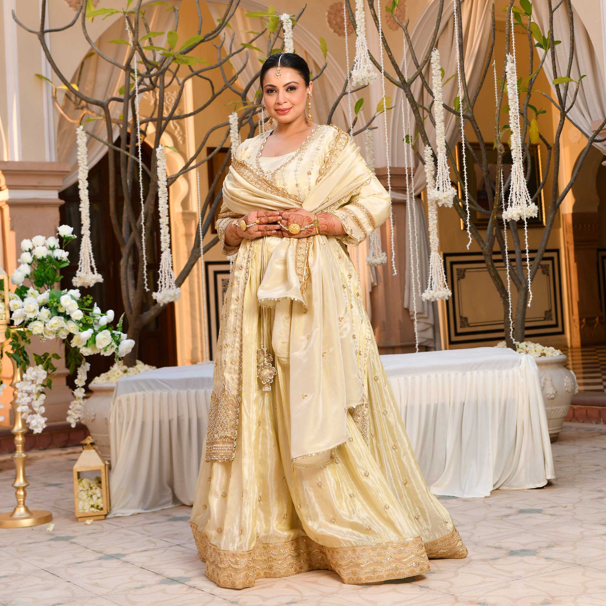 TAAJ- Ivory & Gold Cutdana Embroidered Lehenga Set with Cape