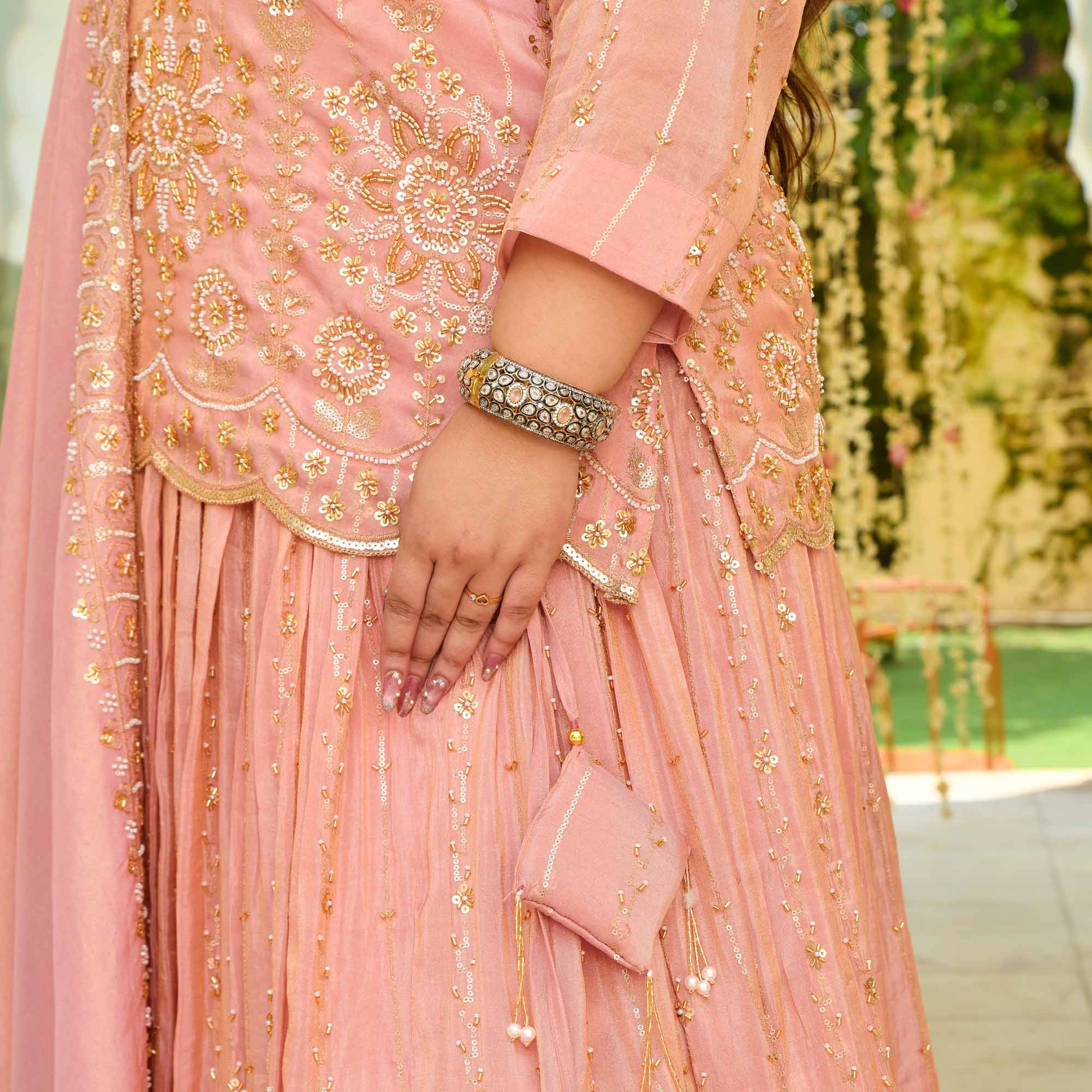 Raabta- Rose Gold Cutdana Embroidered Pure Tissue Silk Lehenga Set