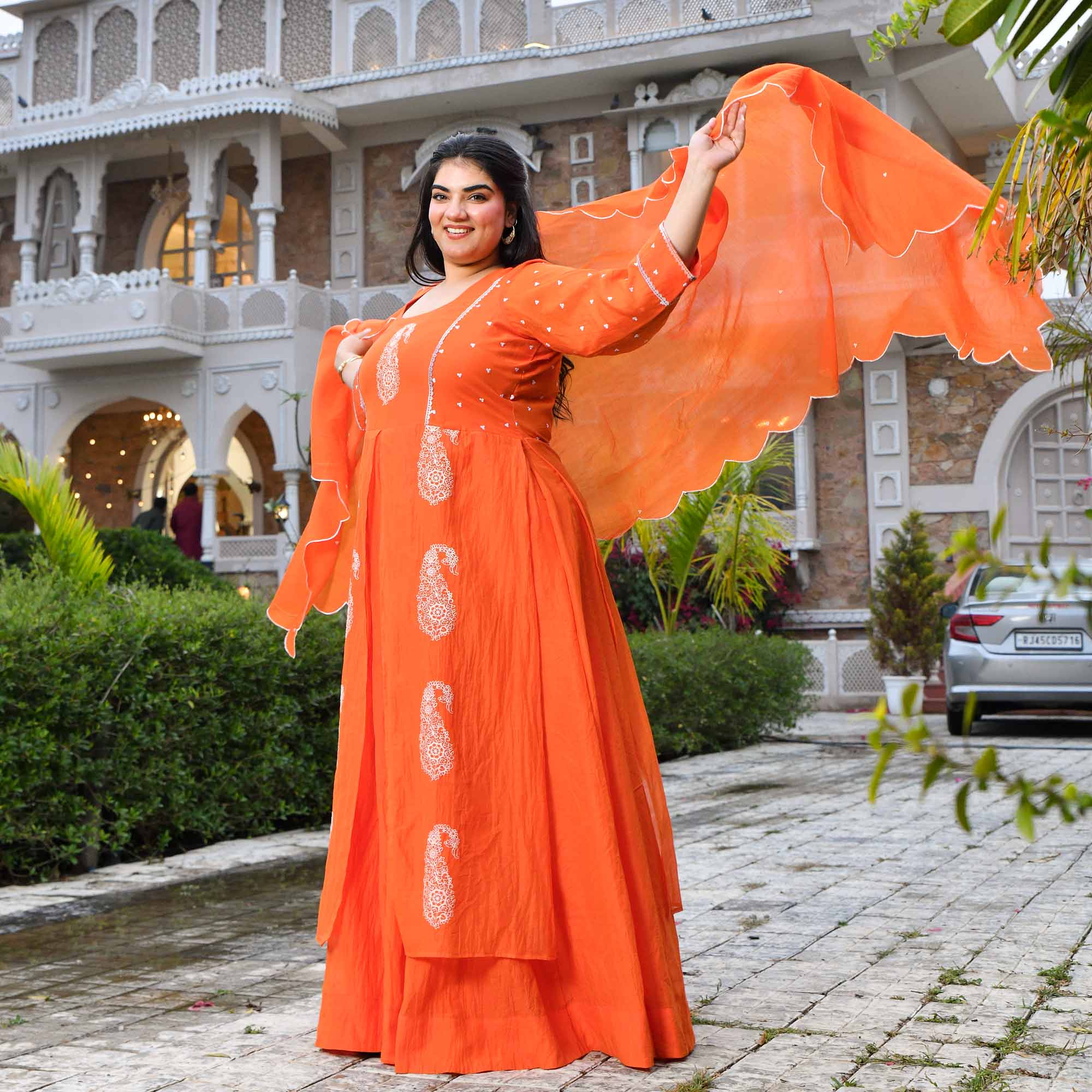 Kinnow- Tangerine Orange Paisley Thread Embroidered Mul Chanderi Anarkali Dress
