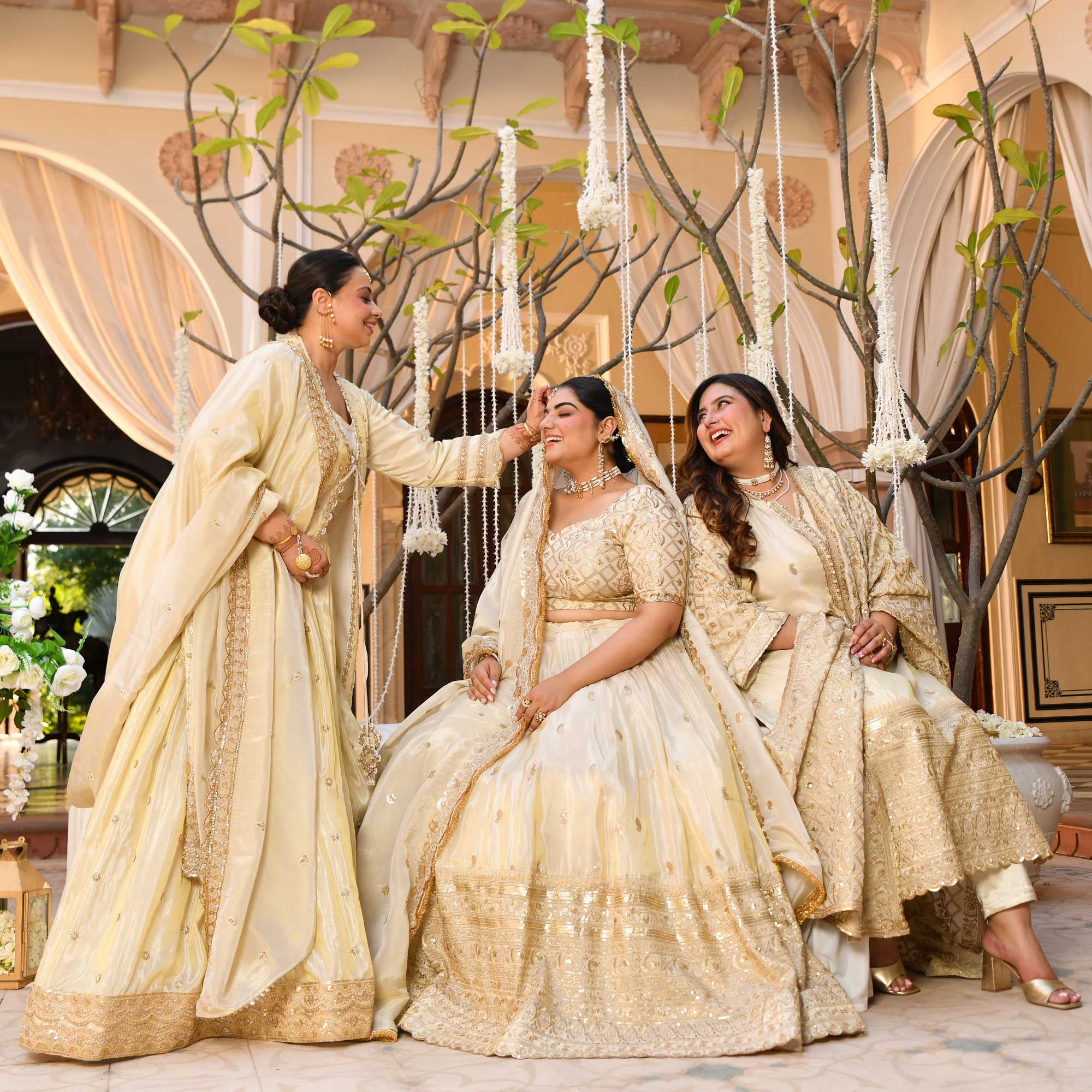 TAAJ- Ivory & Gold Cutdana Embroidered Lehenga Set with Cape