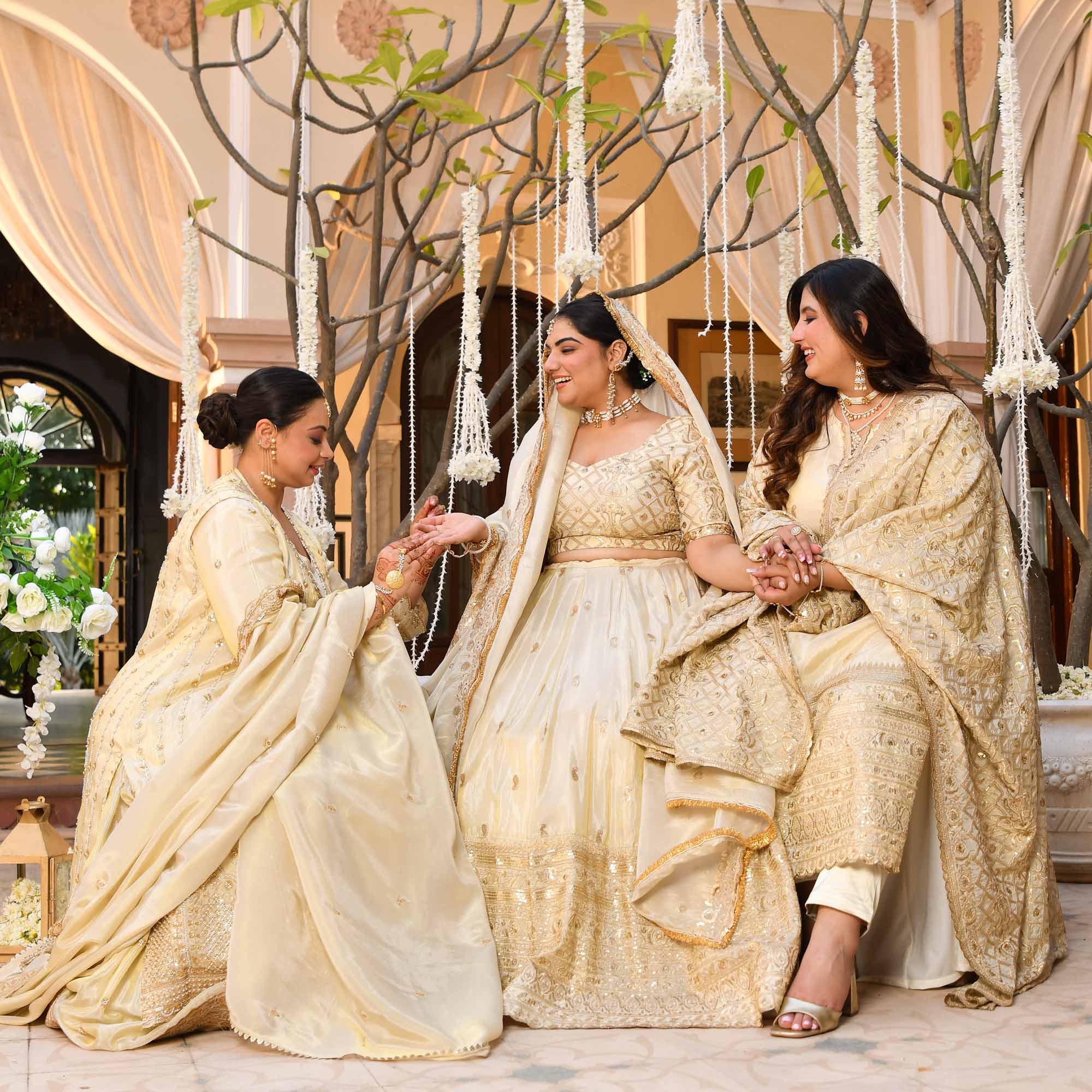 TAAJ- Ivory & Gold Cutdana Embroidered Lehenga Set with Cape