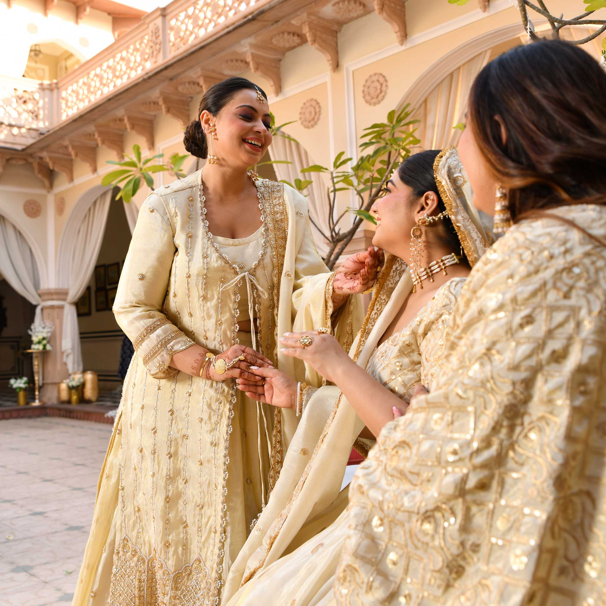 TAAJ- Ivory & Gold Cutdana Embroidered Lehenga Set with Cape