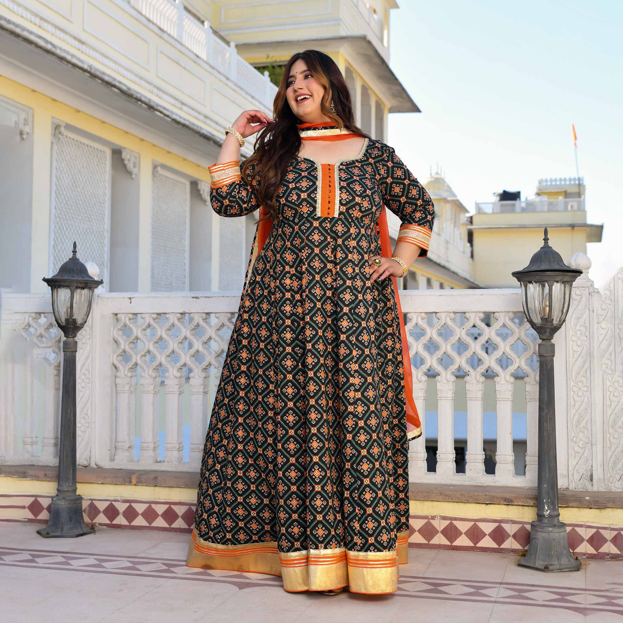 Madhuban- Patola Black with Orange Anarkali