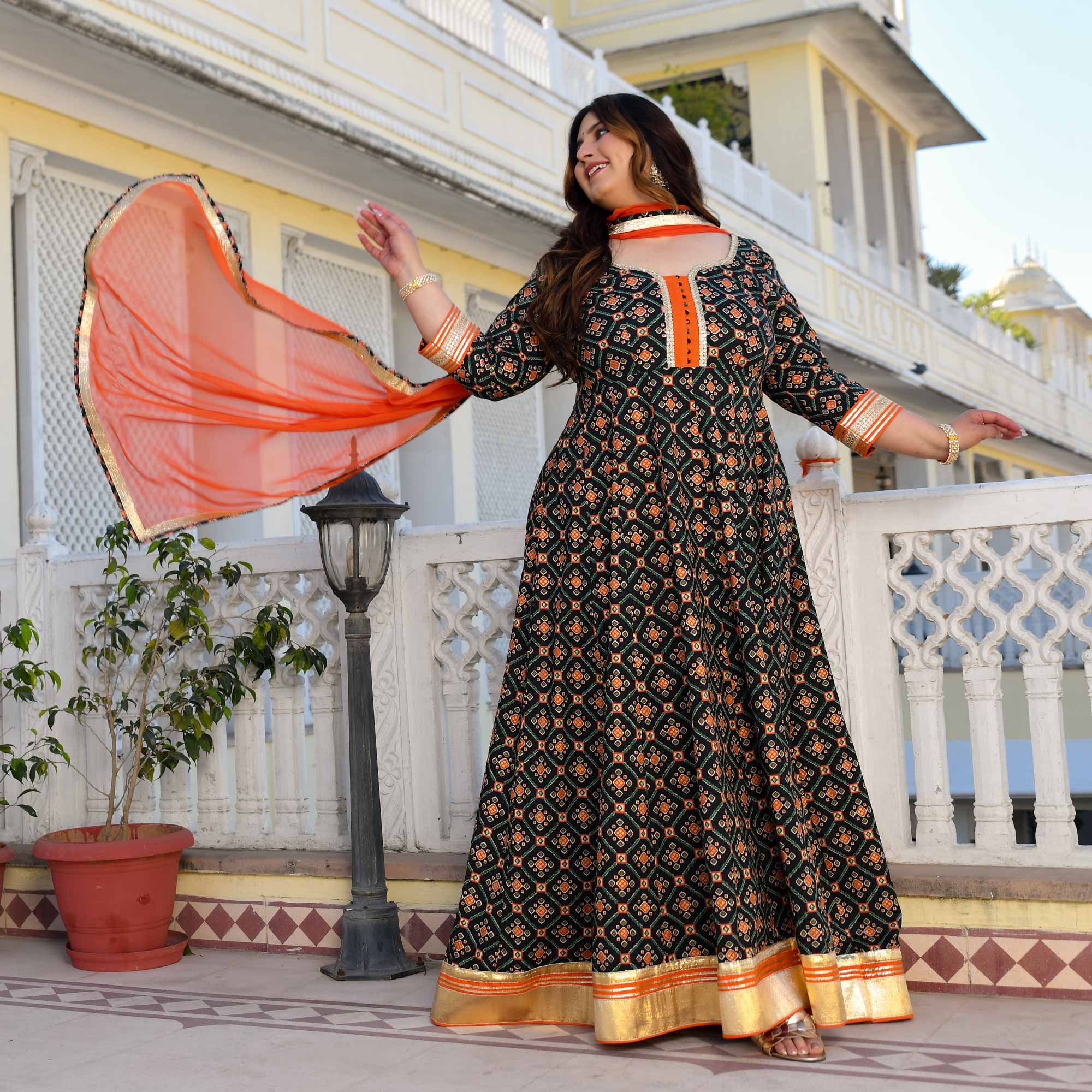 Madhuban- Patola Black with Orange Anarkali