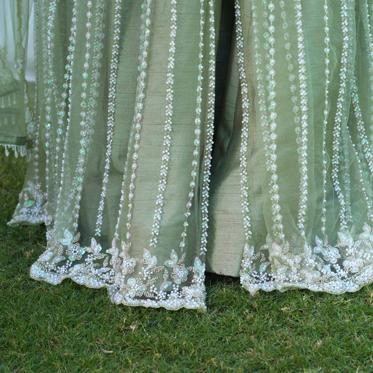Trinity- Pistachio Green Pearl & Sequin Embroidered Net Cape Lehenga Set