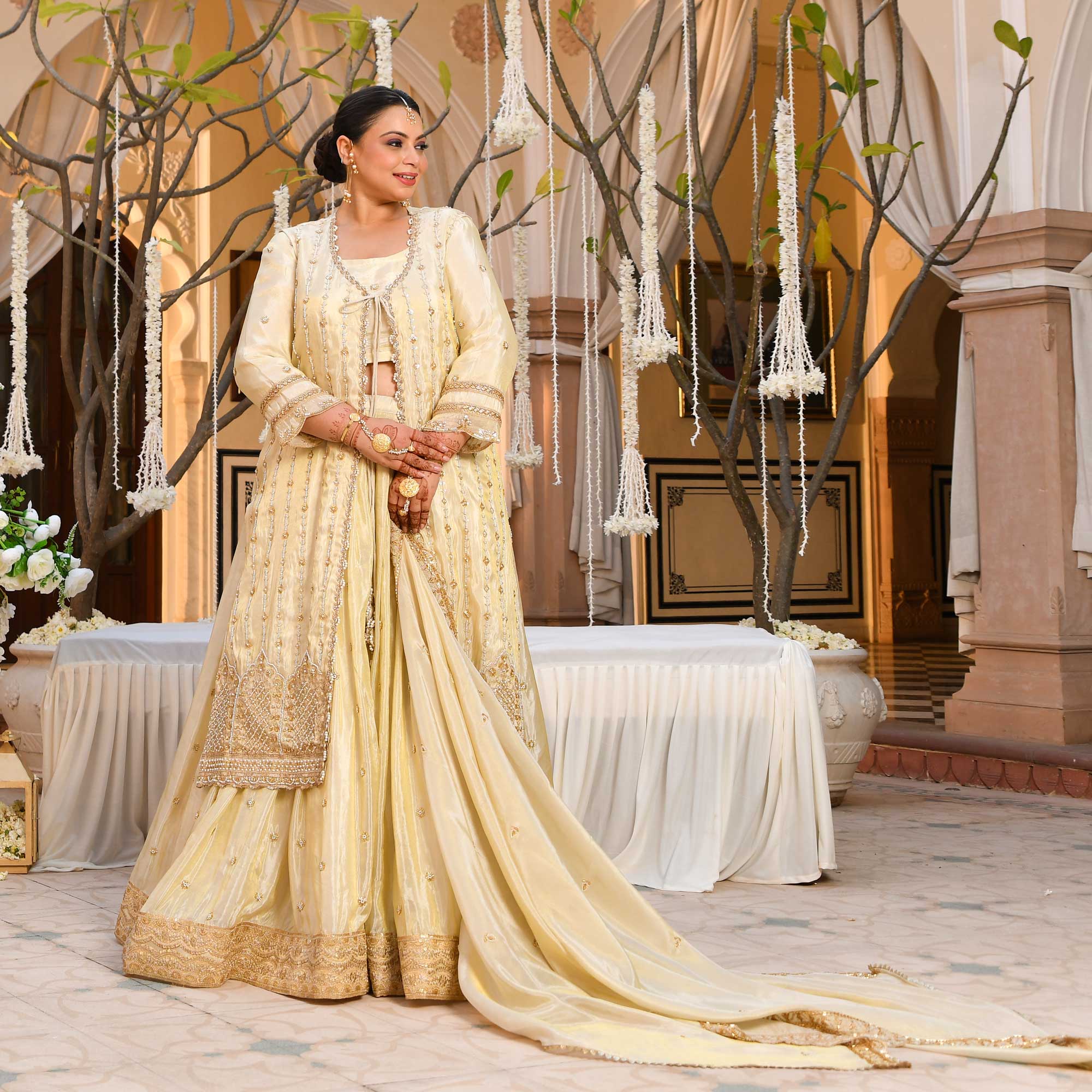 TAAJ- Ivory & Gold Cutdana Embroidered Lehenga Set with Cape