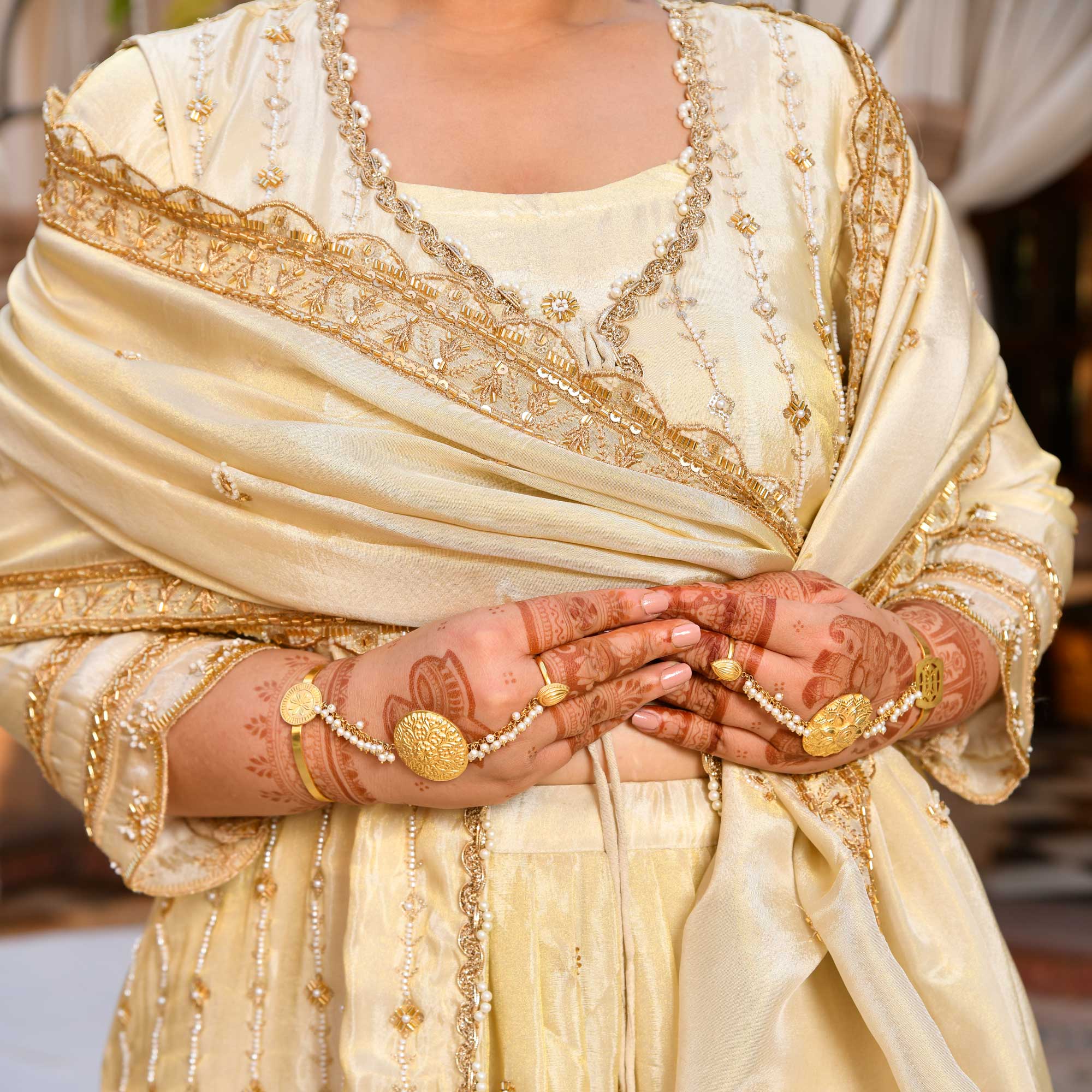 TAAJ- Ivory & Gold Cutdana Embroidered Lehenga Set with Cape
