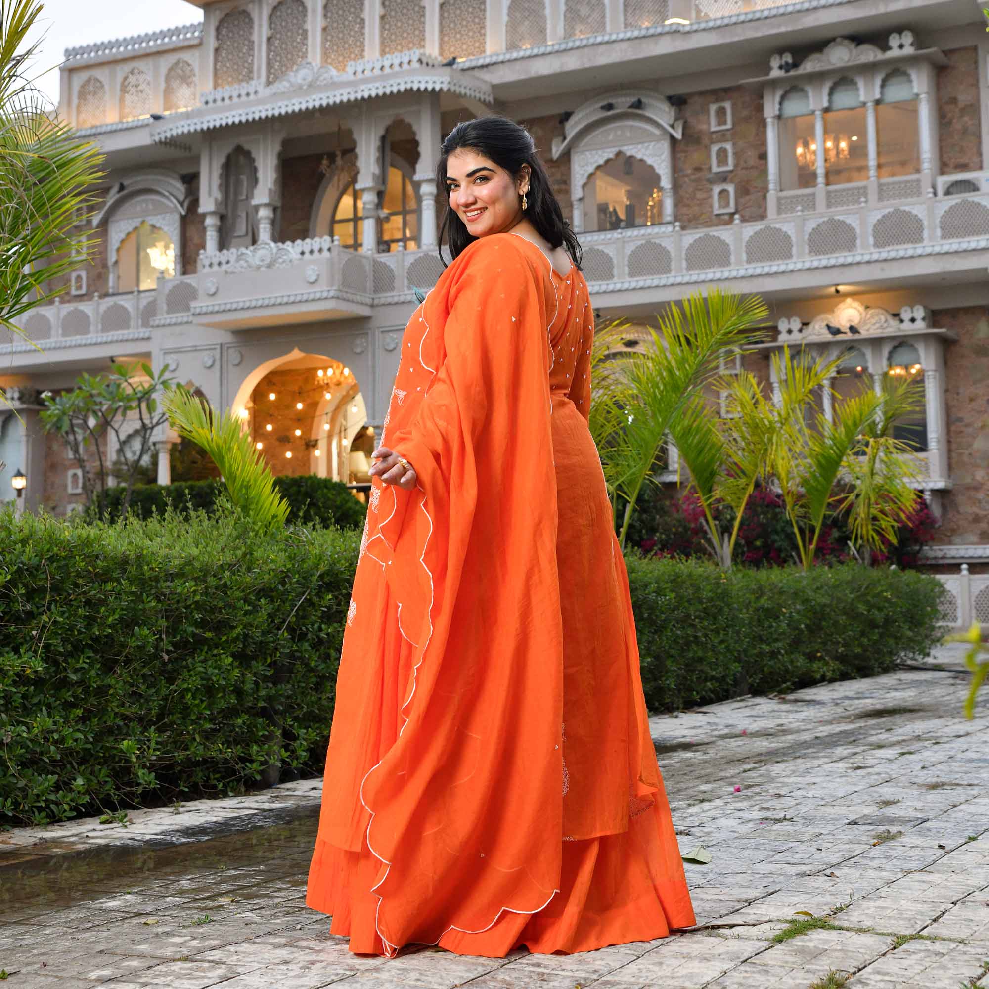 Kinnow- Tangerine Orange Paisley Thread Embroidered Mul Chanderi Anarkali Dress