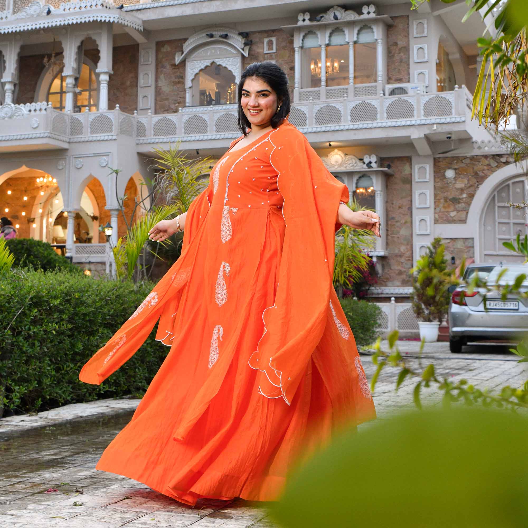 Kinnow- Tangerine Orange Paisley Thread Embroidered Mul Chanderi Anarkali Dress